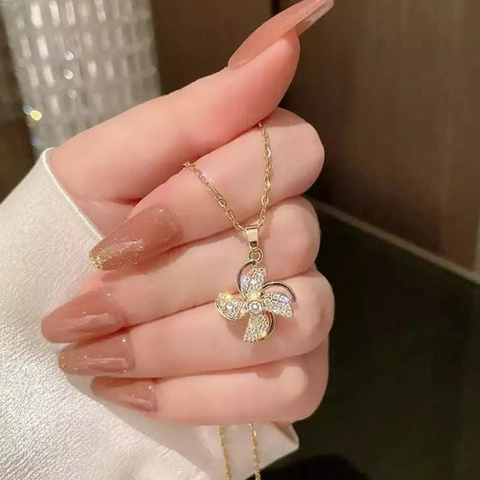 Charming Flower Pinwheel Rotating Necklace – A Whirl of Elegance